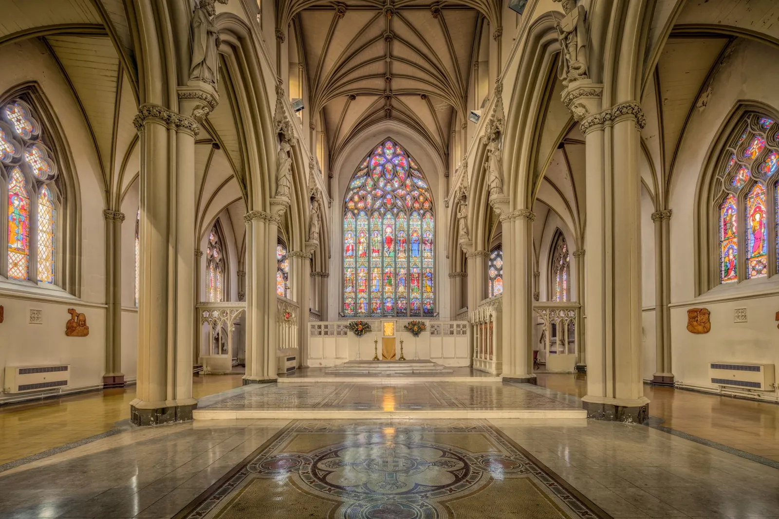Interior view of Salford Cathedral's intricate gothic architecture in England.