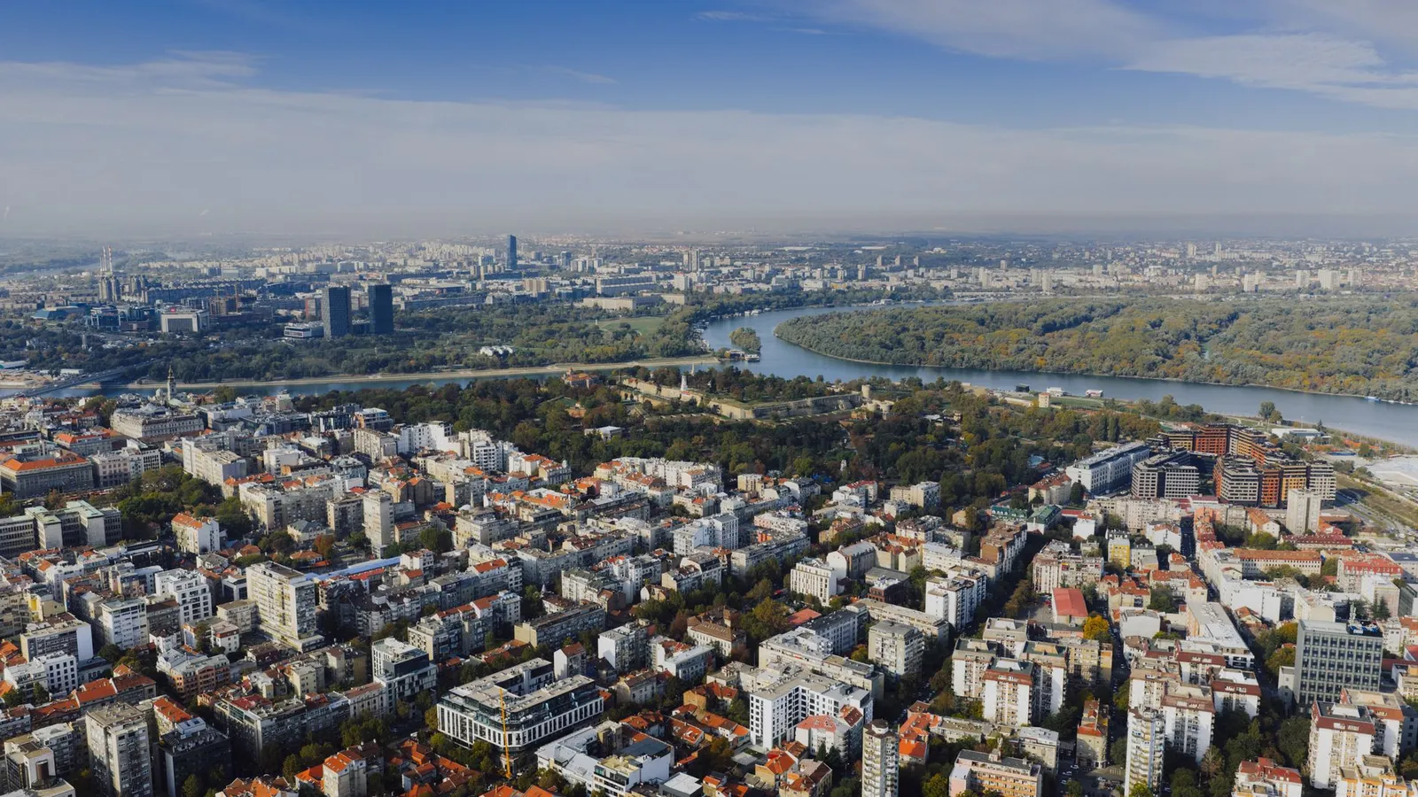 Stunning aerial view of Belgrade cityscape with the Danube river and city skyline in Serbia.