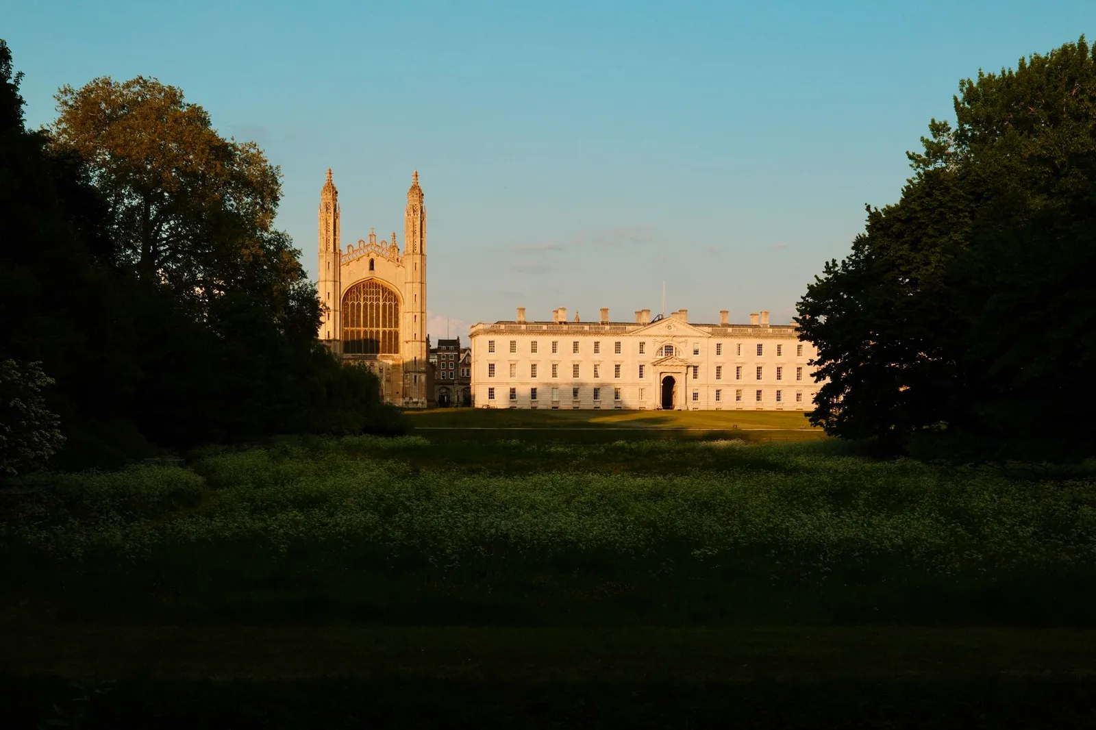 Stunning view of King's College Chapel and complex bathed in sunset light, Cambridge, UK.
