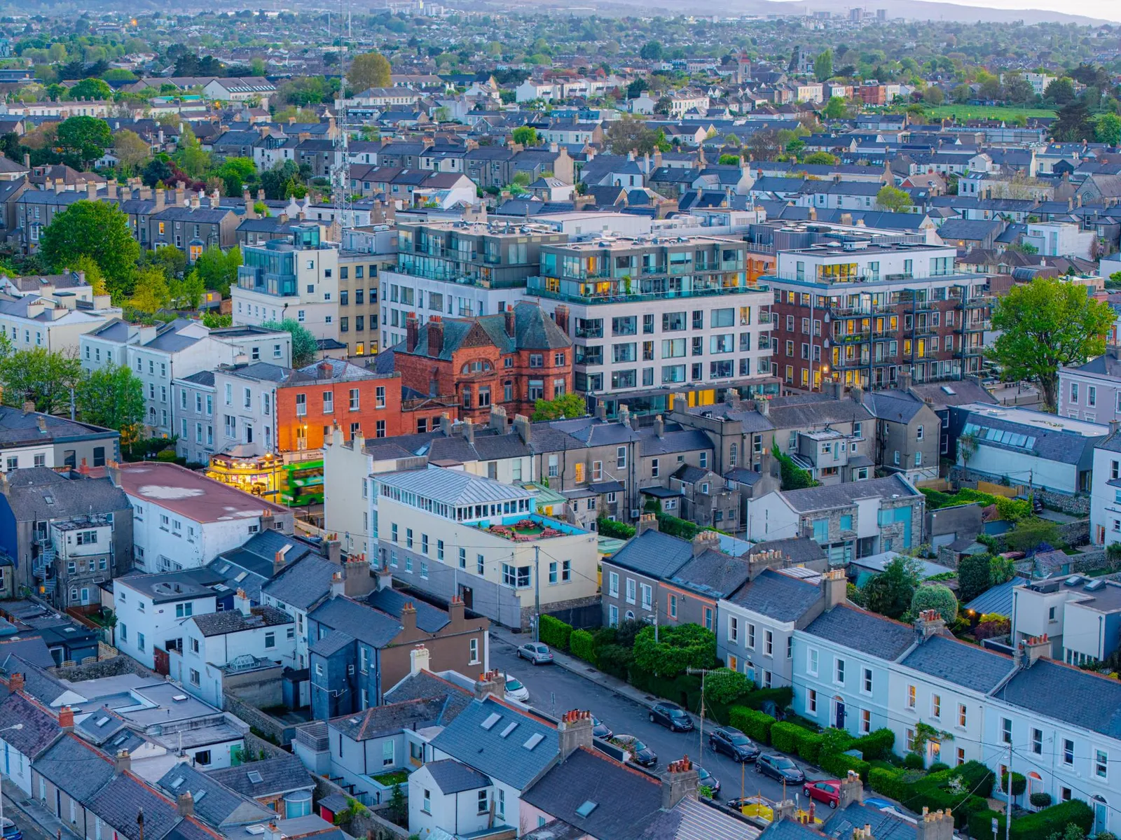 Stunning aerial view of Dublin cityscape with architectural diversity at twilight.