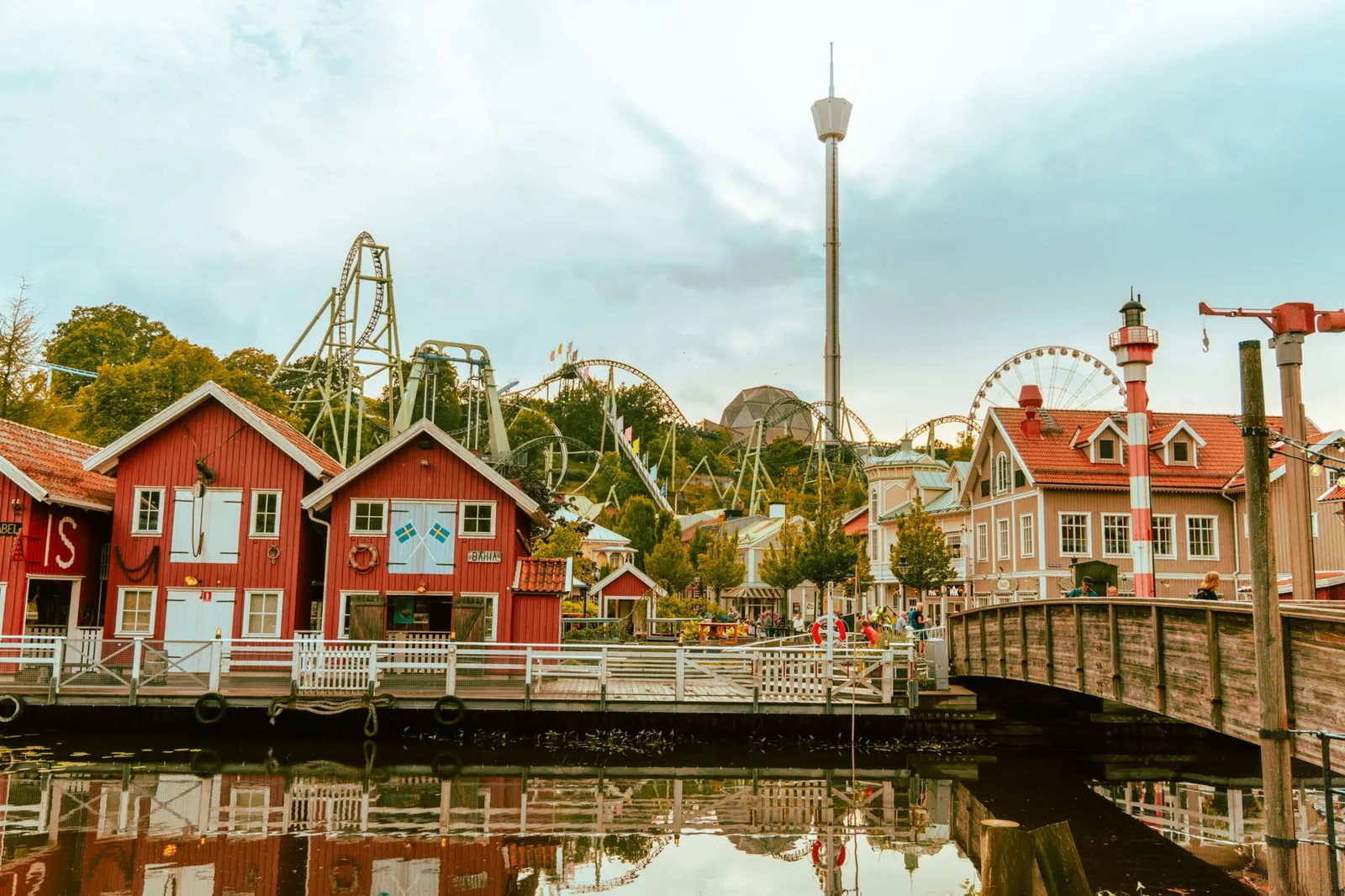 Scenic view of Liseberg amusement park with charming architecture and rides in Gothenburg, Sweden.