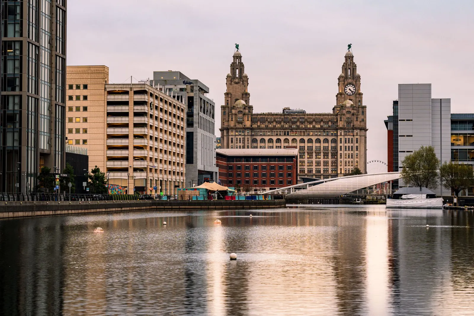 Captivating view of Liverpool's waterfront showcasing the historic Liver Building and modern architecture.