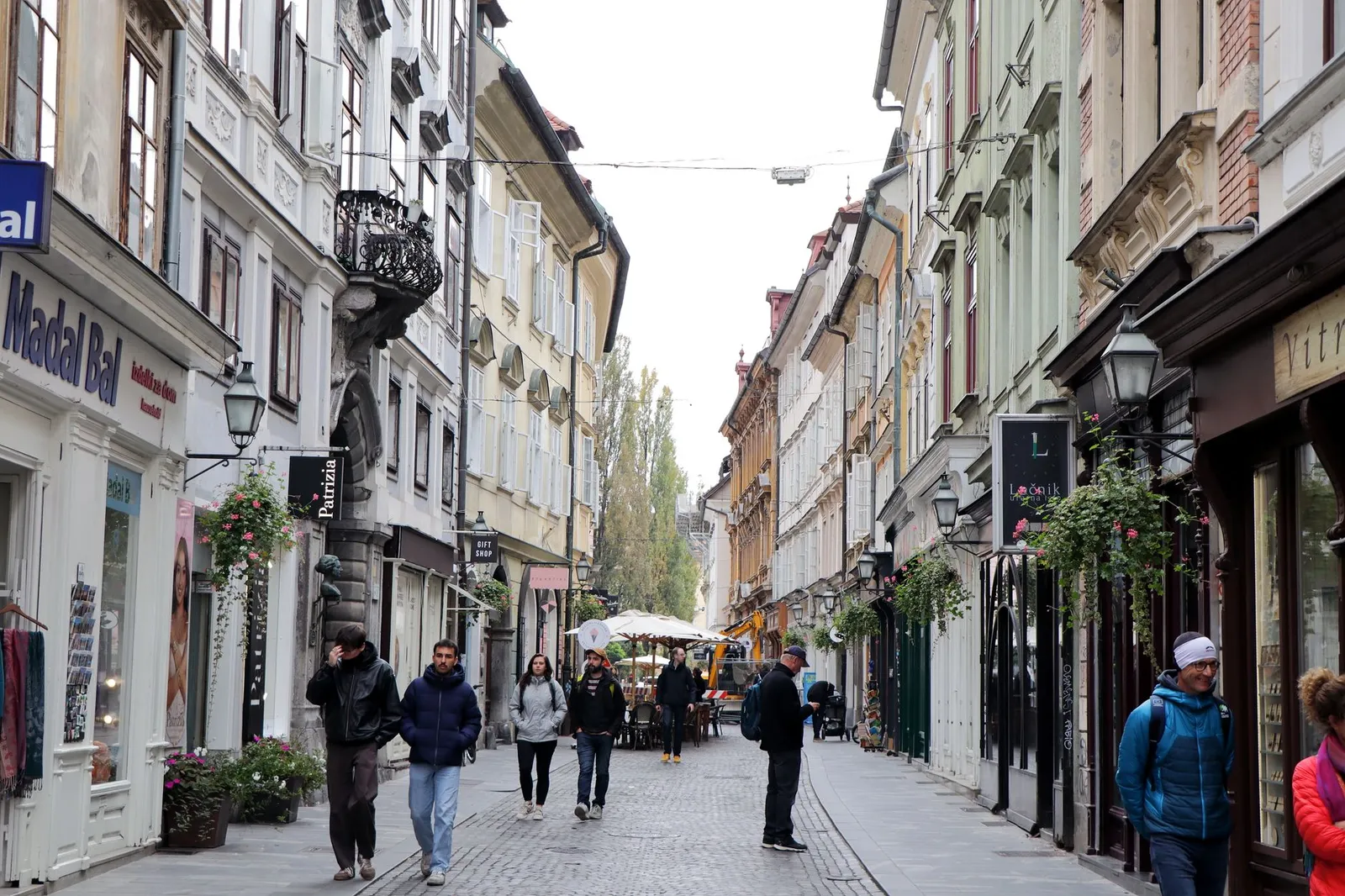 Explore the picturesque pedestrian street lined with historic buildings in Ljubljana, Slovenia.