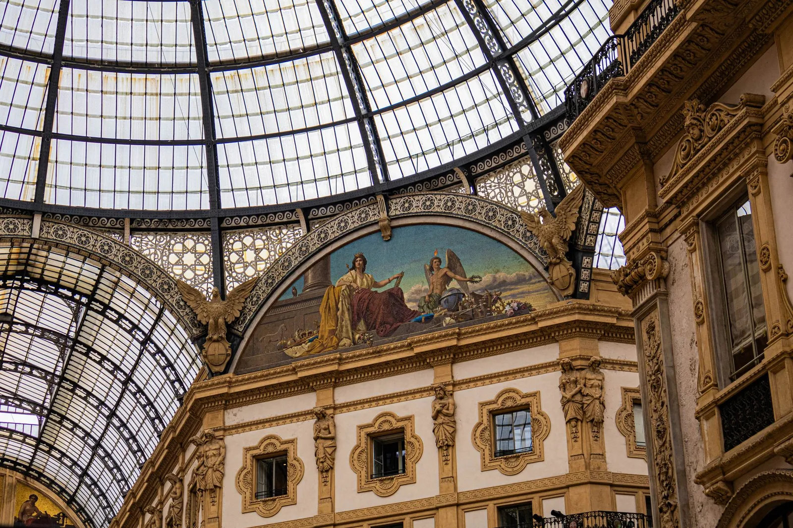 Explore the art and elegant architecture of Galleria Vittorio Emanuele II in Milan, Italy.