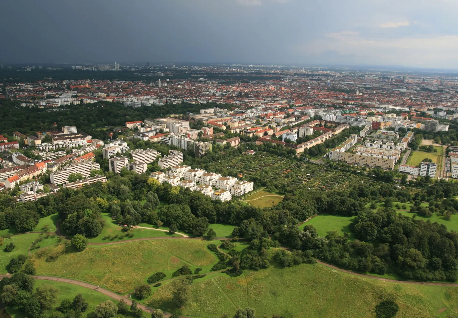 Stunning aerial view of Munich showing the city's urban landscape and green parks.