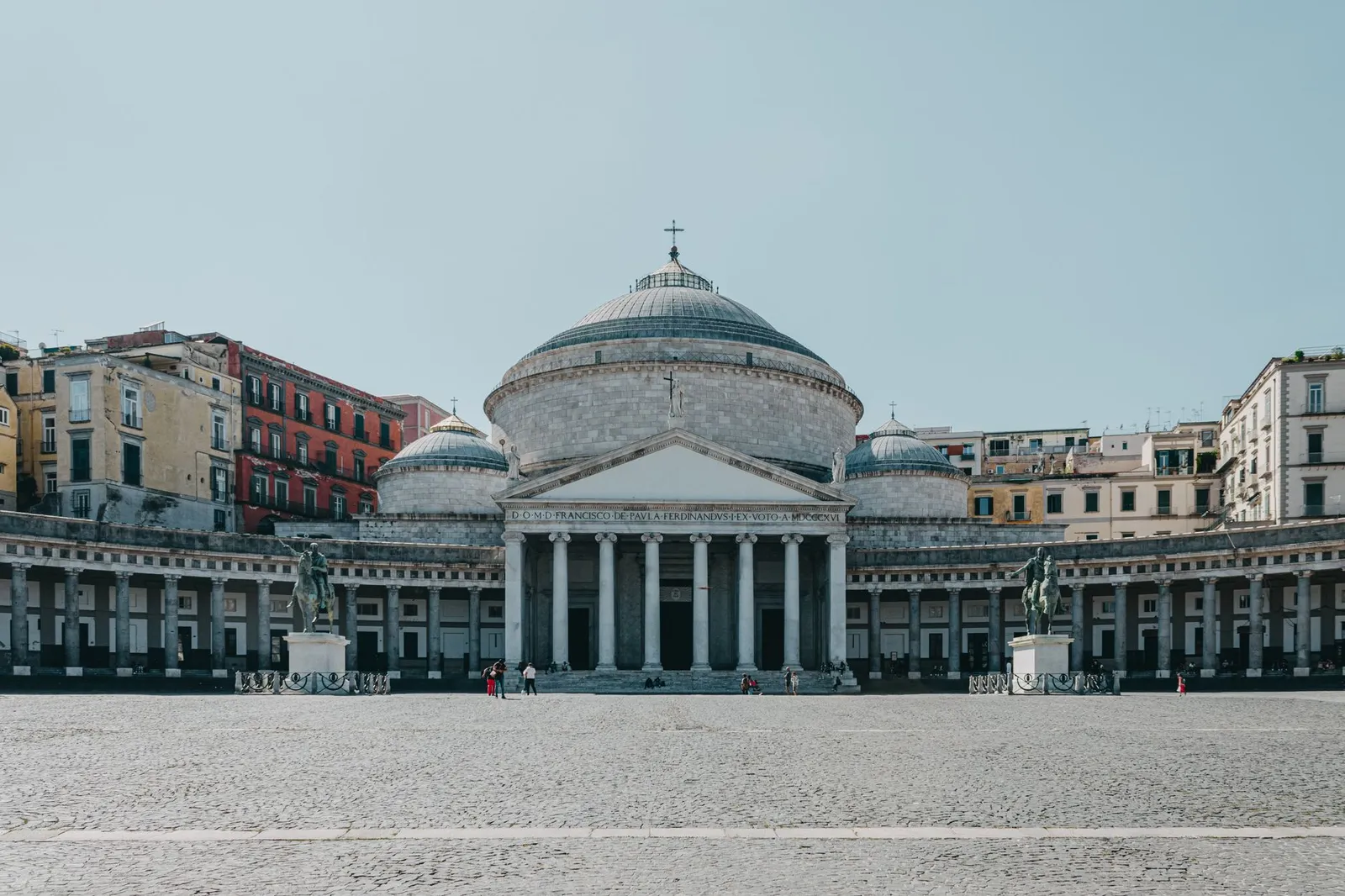 View of the iconic Piazza del Plebiscito and San Francesco di Paola in Naples, Italy.