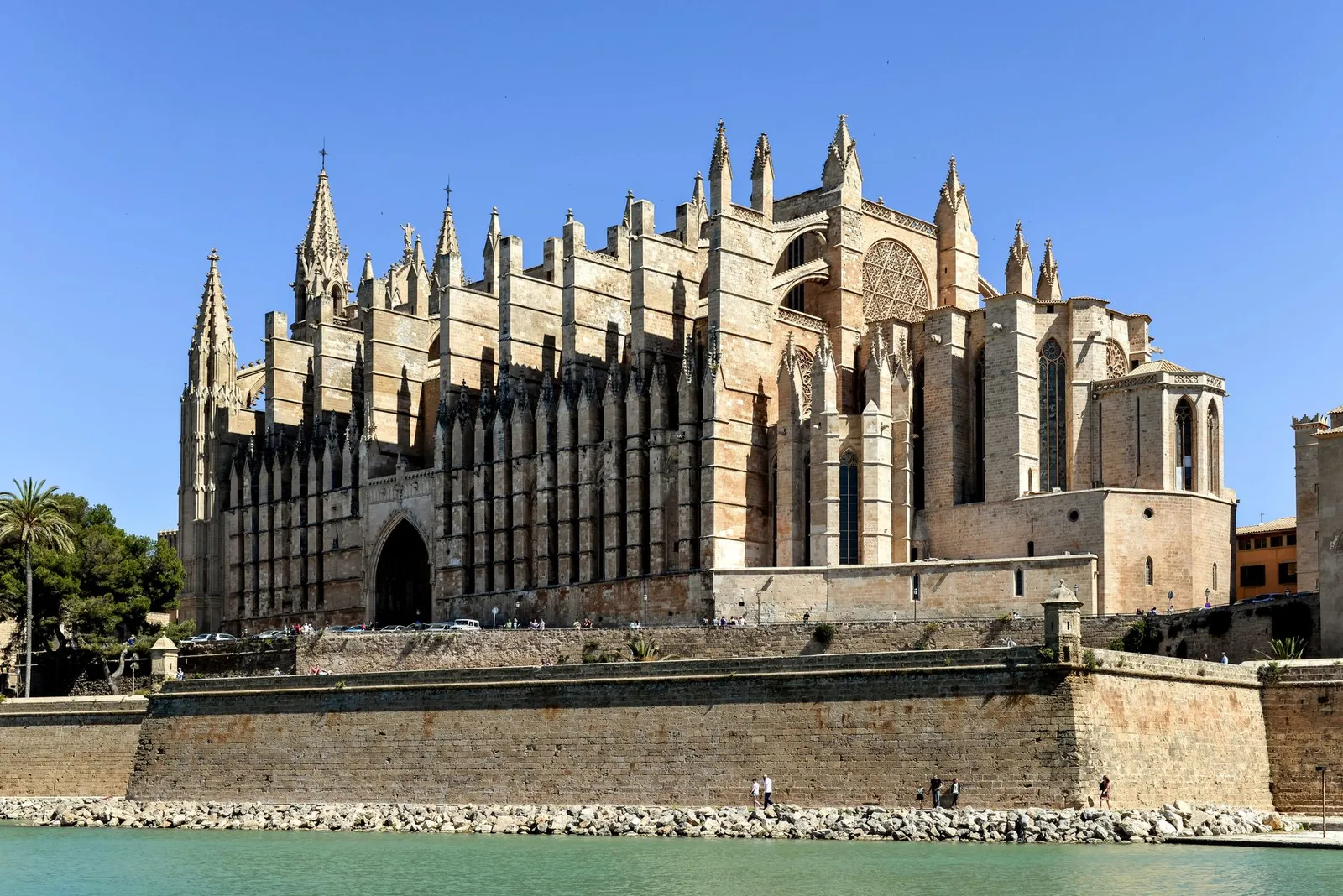 Majestic Gothic cathedral facade in Palma, Mallorca, Spain by the waterfront.