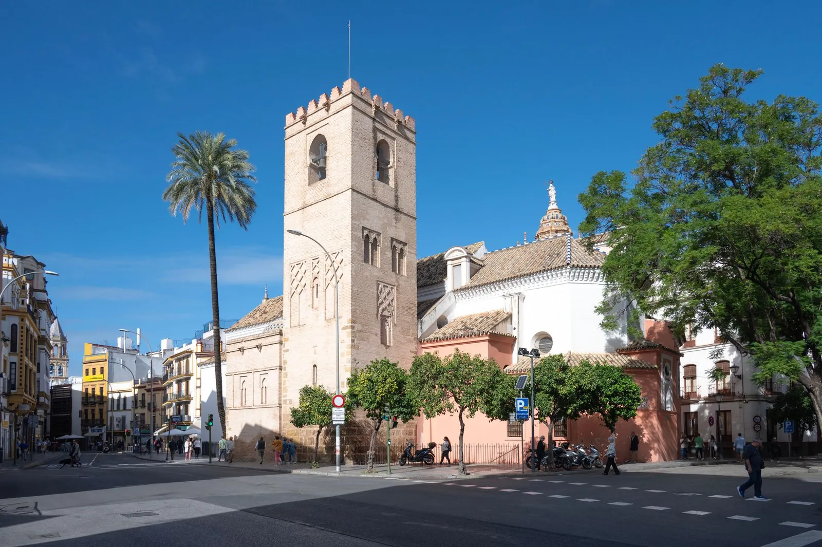 View of the Santa Catalina Church in Seville, Spain, showcasing its historic architecture and urban surroundings.