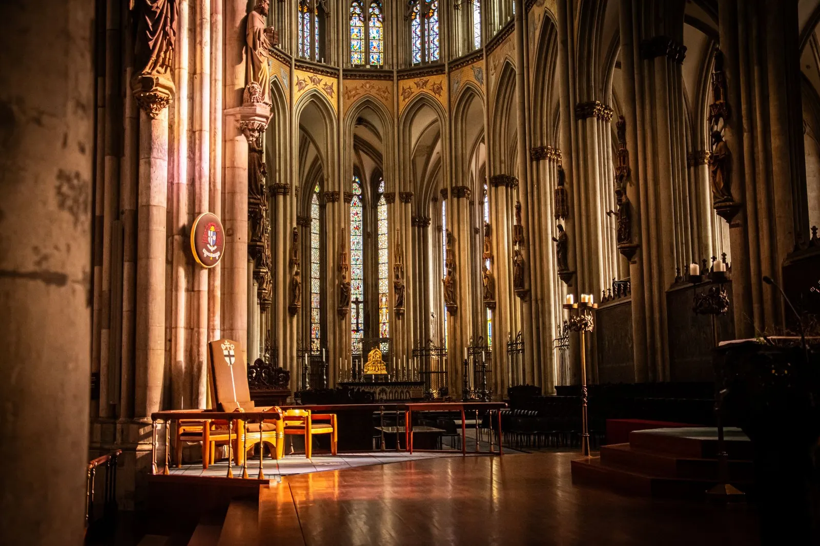 Beautiful interior view of the historic Cologne Cathedral showcasing its Gothic architecture and intricate details.