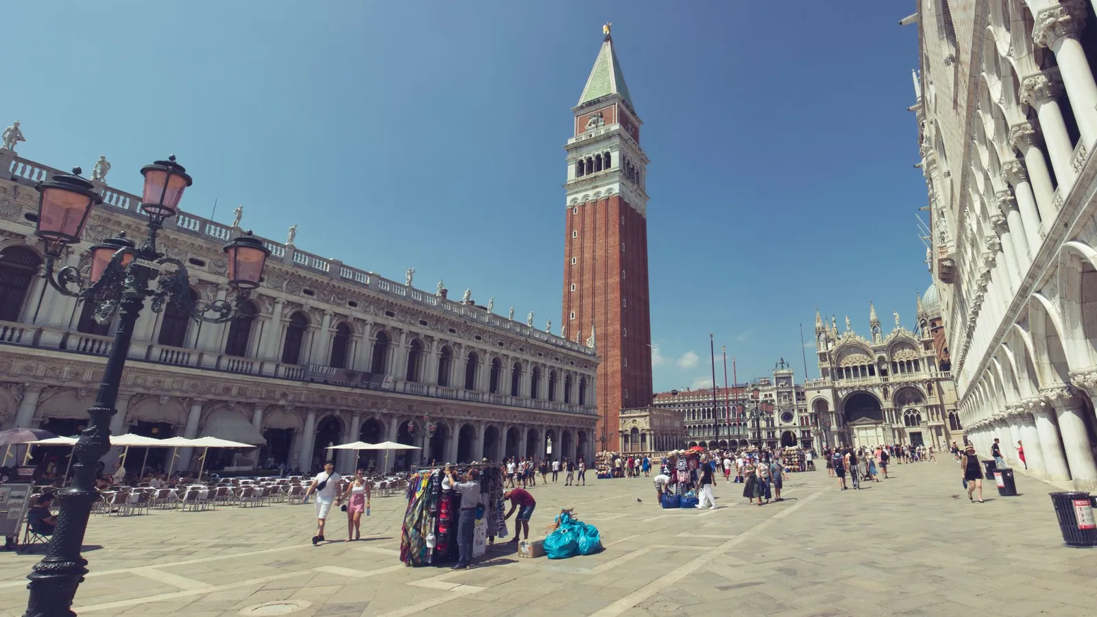 Explore vibrant Piazza San Marco in Venice with its iconic landmarks and lively environment.
