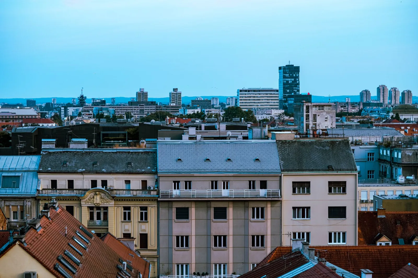 Aerial cityscape of Zagreb showcasing historic buildings and modern skyline.